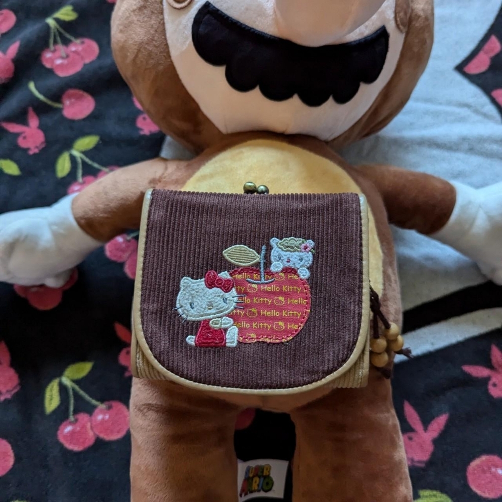hello kitty 2007 curduroy walletwith red apple, brown/tan colors